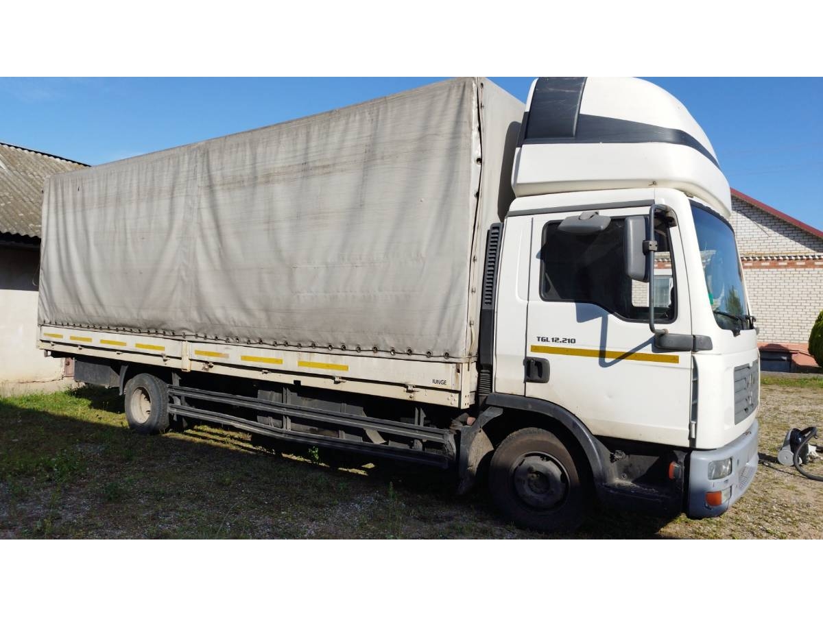 Грузовик тентованный  MAN TGL12210